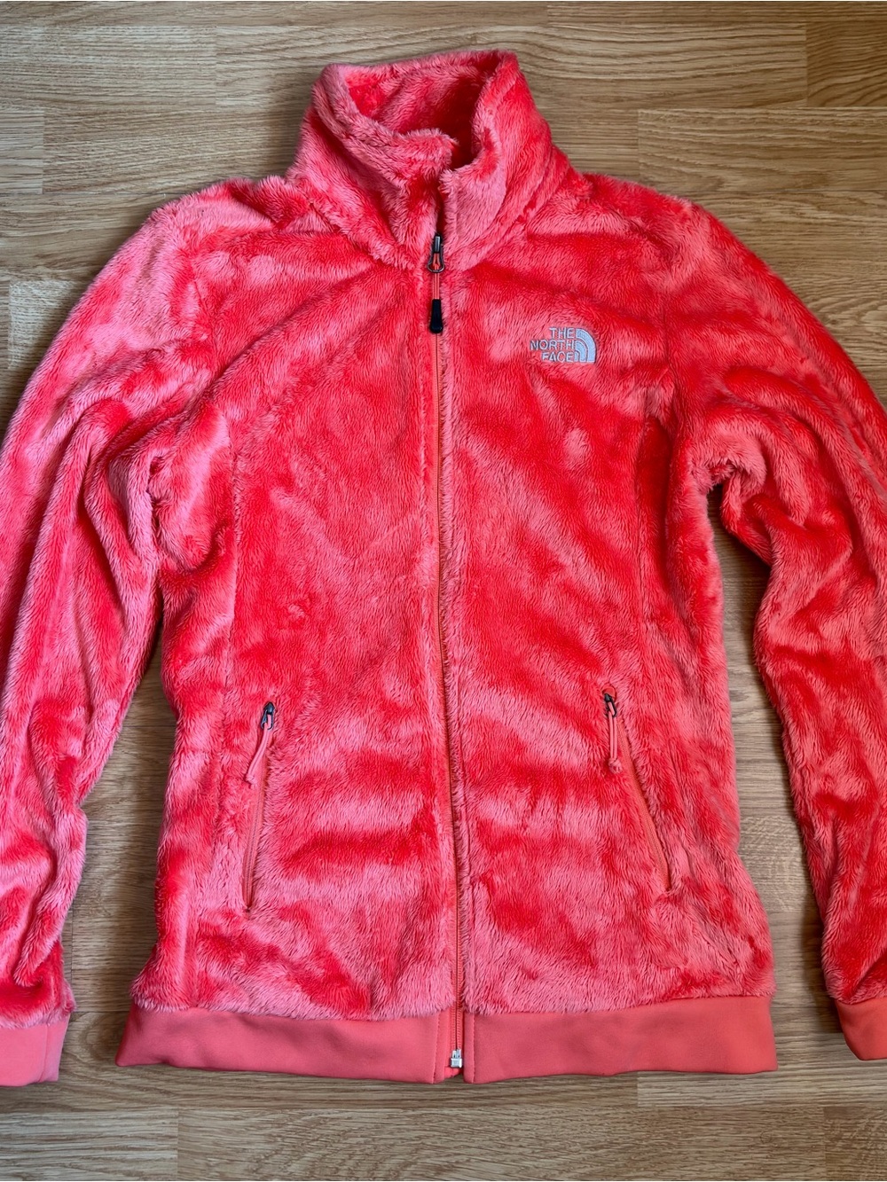 The North Face Womenโs Coral Pink Plush Zip-Up Jacket